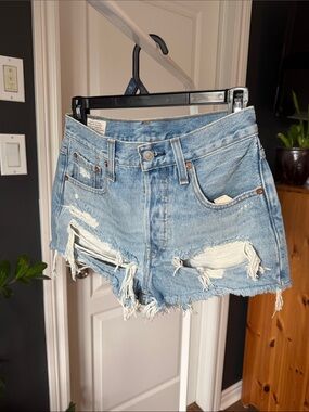 Levi’s 501 Distressed Light Blue Denim Shorts